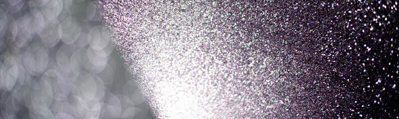 background of abstract glitter lights. silver and white. de-focused