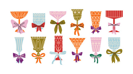 Set of festive glasses for alcoholic cocktails of different forms. Decorative elegant faceted glasses on legs with ribbons and bows. New Year's stickers of the holiday and fun. Container for drink