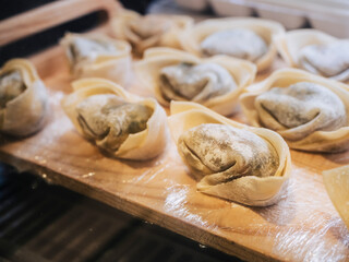 Dumpling Wonton Chinese food with meat filling Asia restaurant cooking