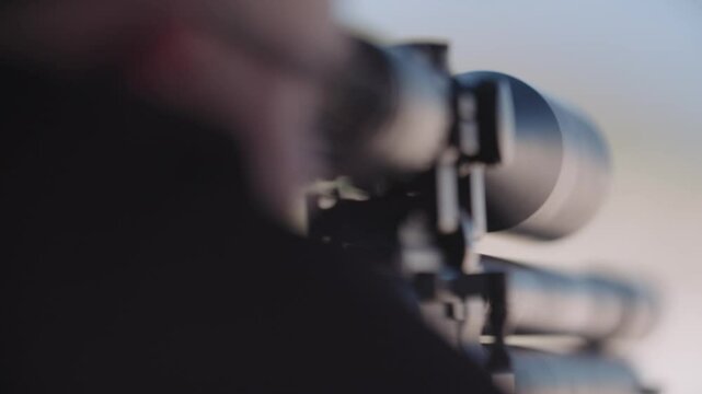 Looking down the scope at a target