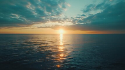 Fototapeta premium Golden Sunset Over Calm Sea