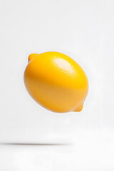 A lemon fruit, floating in midair, isolated on clean white background,