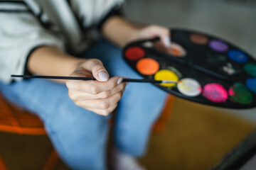 hand of woman artist with brush paint picture art artistic and artwork