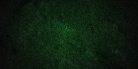 Grunge dark green rock studio stucco antique grunge spot light backdrop background. concrete distressed gradient limestone sketch wall rough blank aged texture background.