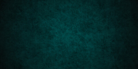 Grunge dark green rock studio stucco antique grunge spot light backdrop background. concrete distressed gradient limestone sketch wall rough blank aged texture background.