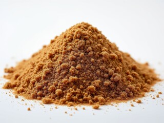 Fine-grain brown sugar in a pile on a clean white background, showcasing natural sweetness and granular texture