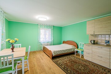 interior room apartment bedroom with bed, cozy place to sleep and relax