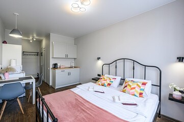 interior room apartment bedroom with bed, cozy place to sleep and relax