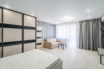 interior room apartment bedroom with bed, cozy place to sleep and relax
