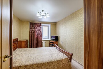 interior room apartment bedroom with bed, cozy place to sleep and relax