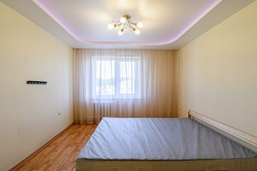 interior room apartment bedroom with bed, cozy place to sleep and relax