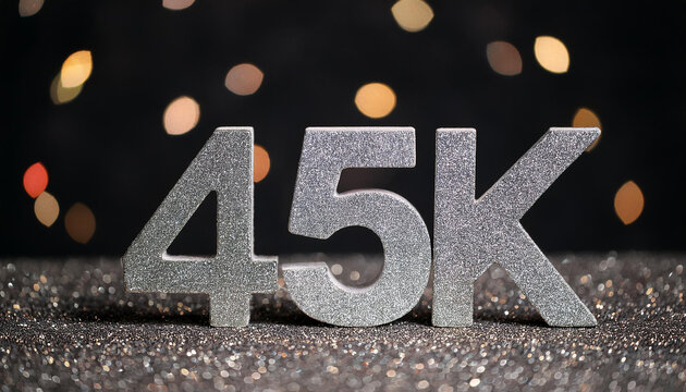 45k followers celebration. Silver text. Social media achievement. Black glittering backdrop.