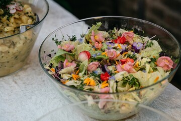 Vibrant Edible Flower Salad in Glass Bowl