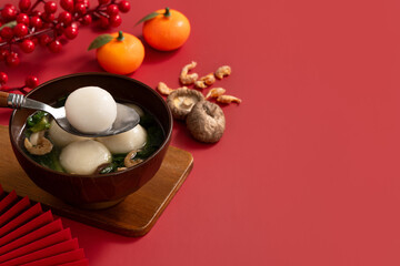 Big tangyuan, yuanxiao with savory soup for traditional lunar festival.