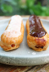 Closeup of Delectable Vanilla and Chocolate Eclairs