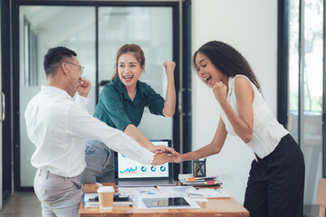 Team Celebration: A diverse group of colleagues celebrates success and achievements together in a modern office setting.  Their infectious energy and positive vibes inspire teamwork and motivation.