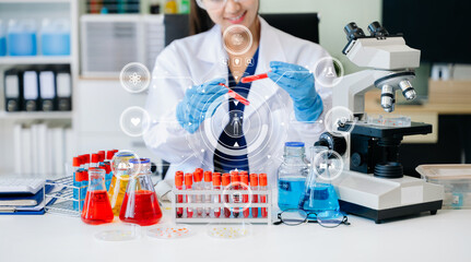 DNA molecule testing concepts. The doctor in a mask examines DNA molecules on the chemical...