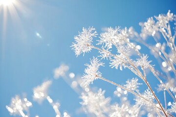 Naklejka premium Elegant Christmas-themed background featuring sparkling white snowflakes on a rich blue winter sky