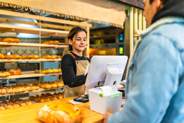 Man checking out in an artisan bakery