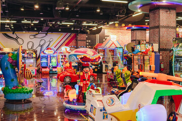 The interior of an arcade game center named Timezone in an Indonesian mall.