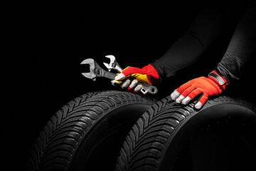 2025 New year Car Service Auto Tires and Hands of Mechanic with wrench