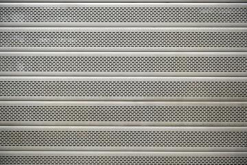 Stainless steel metal shutter with small horizontal perforations