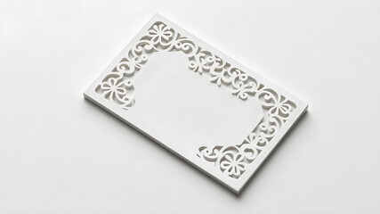 A creative business card with intricate laser-cut designs, resting on a simple, monochrome background, in 8K detail.