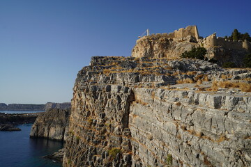 acropolis of Lindos and rocky cliffs