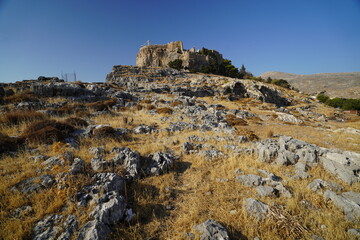 acropolis of Lindos and rocky cliffs
