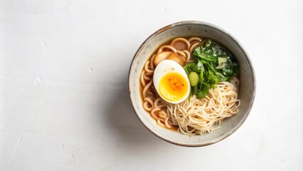 Close-up of a bowl of ramen noodles with a soft boiled egg, green onions, and broth.