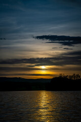 Vysatov pond with sunset color light in autumn sunny evening
