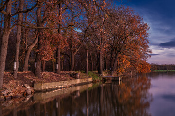 Vysatov pond with sunset color light in autumn sunny evening