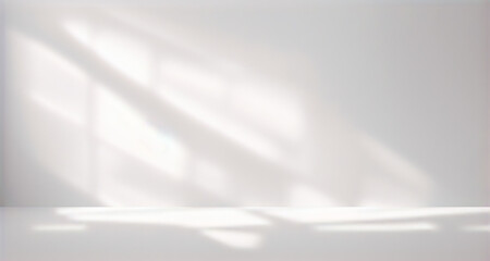Soft shadow and light from windows on white wall. Minimal abstract light gray background for...
