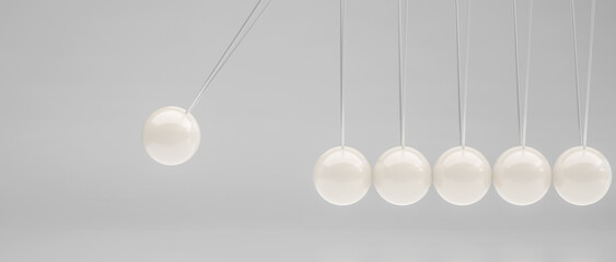Newton's cradle demonstrating the principle of conservation of momentum