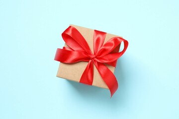 Beautiful gift box on color background