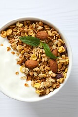 Delicious granola with yogurt on the table
