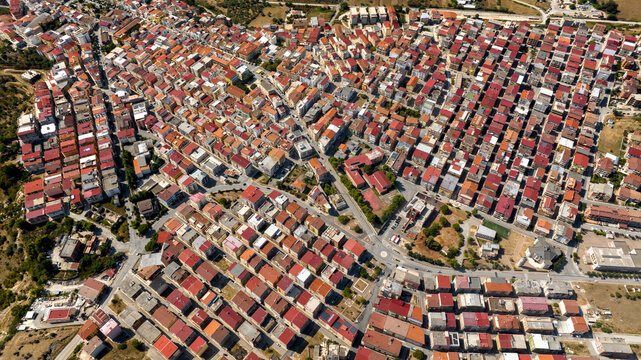Aerial view of houses, apartments and buildings of the town of Cagnano Varano located in the province of Foggia, in Gargano, Puglia, Italy. 