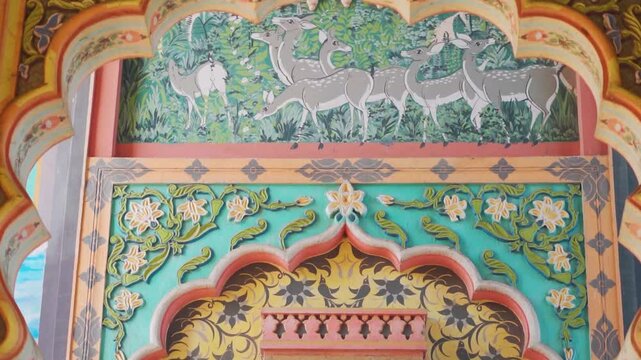 Close up shot of architectural details on wall of Patrika gate in Jaipur, Rajasthan, India. Many Colorful patterns on old walls of Patrika gate. Old Pink city.