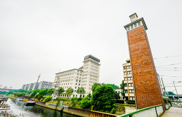 View of the surrounding area at the harbor in Duisburg. Industrial port on the Ruhr. Tower at the...