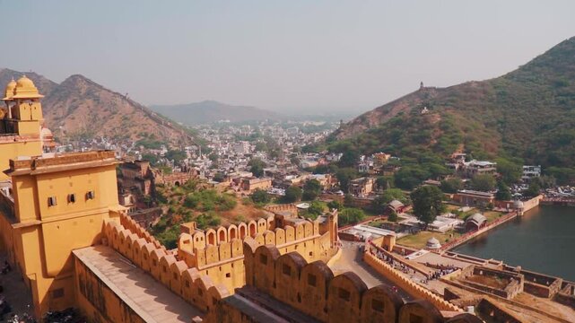 View of Jaipur city as seen from Amer Fort in Jaipur, Rajasthan, India. Travel and holidays concept. Ancient Indian city Jaipur with Aravalli Hills in background. 