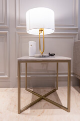 lamp table, side table, coffee table. the table is made of a mixture of marble and granite, the modern minimalist steel frame adds a strong expressive impression. 