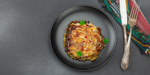 Homemade vegan cabbage steaks with herbs and spices. Healthy food ready to eat on a serving plate