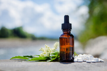 Amber Glass Bottle with Pills Outdoors