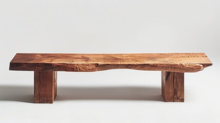 A minimalist wooden bench with a natural finish, designed for seating or decor.