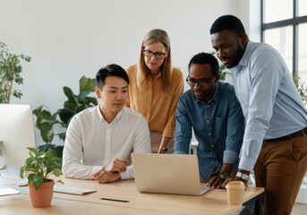 Fototapeta premium Business professionals working together, analyzing data and strategizing on a laptop in a bright, modern office
