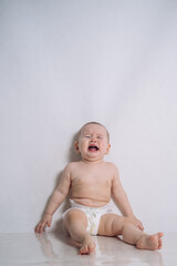 a frustrated child on a white background