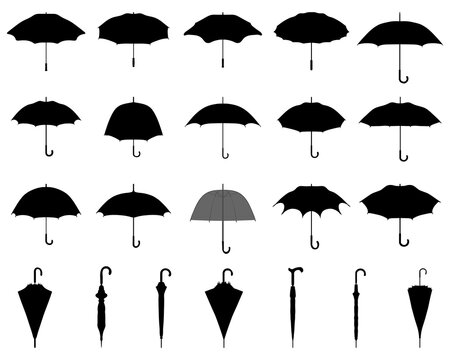 Black silhouettes of open and closed umbrellas on a white background	