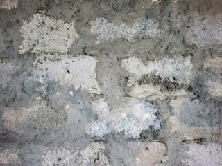 Old Brick Wall With Peeling Plaster