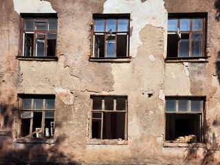 
Broken Windows Of A Destroyed House