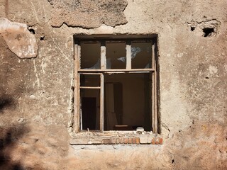 Broken Window Of A Destroyed House